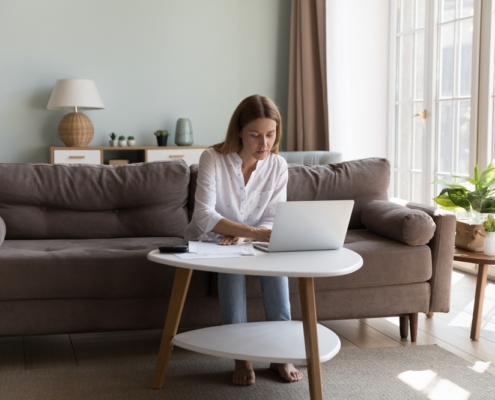 A woman buys prepaid electricity online