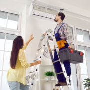 Woman hires an electrician to rewire her ac unit instead of doing it herself